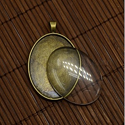 40x30mm Clear Oval Glass Cabochon Cover and Antique Bronze Alloy Blank Pendant Cabochon Settings for DIY Portrait Pendant Making&nbsp;DIY-X0159-AB-FF