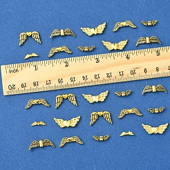 チベットスタイルの合金ビーズ105個。  ウイング  アンティーク黄金  4~22x3~21.5x3~4mm  穴：1~1.5mm  105個/セット&nbsp;TIBEB-FS0001-09