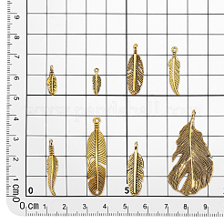 チベットスタイルの合金製フェザーペンダント64個、8スタイル  アンティーク黄金  15~49x5~23x2~4mm  8個/スタイル&nbsp;FIND-PH0022-52AG