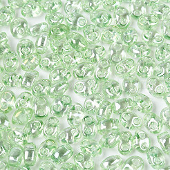 透明色光沢ガラスシードビーズ  オーバル  2穴  薄緑  3~4.5x5~6x2.5~3mm  穴：1~1.2mm  約6080個/ポンド&nbsp;SEED-N008-09D
