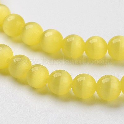 キャッツアイビーズ  ラウンド  きいろ  10mm  穴：0.8mm  約39個/連  15インチ&nbsp;X-CER10mm16-1