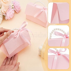 結婚式の記念品キャンディボックスDIYセット  クラフト紙1枚付き  1 pc リボン  ビーズハンドル1個。  2 ペア丸フック & ループ  ハンドバッグの形をした紙のギフトパッケージボックスを作るため  ピンク  13x7.5x8.7cm&nbsp;DIY-WH0250-73E