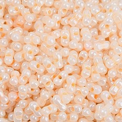 不透明色光沢ガラスシードビーズ  丸い穴  ピーナッツ  桃パフ  3.5x6x3.5mm  穴：0.8mm  約100個/10g&nbsp;X1-SEED-K010-04F
