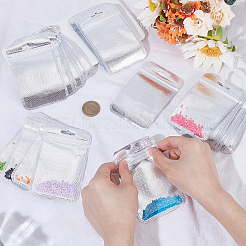 長方形の半透明プラスチック製再封可能袋 50個  プラスチック製バインダーリング付き  銀  11x6.9x0.15cm&nbsp;ABAG-SP0001-58