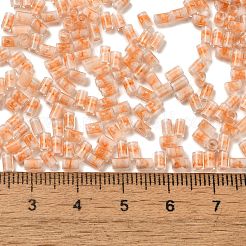 内側は2トーンカラーの透明ガラスシードビーズ  コラム  ライトサーモン  3.5x2.5mm  穴：1.2mm  約18000個/ポンド&nbsp;SEED-C004-05E