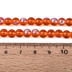 透明電気メッキガラスビーズ連売り  ラウンド  虹メッキ  半分メッキ  レッドオレンジ  6~6.5mm  穴：0.8~1mm  約67~72個/連  14.57~15.35インチ（37~39cm）&nbsp;EGLA-Q132-6MM-01A-14
