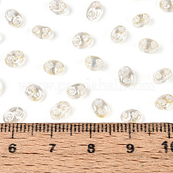 透明色光沢ガラスシードビーズ  オーバル  2穴  ベージュ  3~4.5x5~6x2.5~3mm  穴：1~1.2mm  約6080個/ポンド&nbsp;SEED-N008-09G