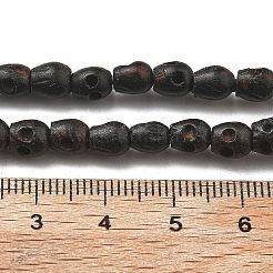 彫刻された木製ビーズ連売り  スカル  ココナッツブラウン  5.5~6x5~5.5x5~5.5mm  穴：1.6mm  約75個/連  18.11''（46センチメートル）&nbsp;WOOD-Q060-03A