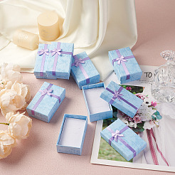 厚紙製ジュエリーセットボックス12個  内部のスポンジパッド付き  記念日のために  結婚式  誕生日  ちょう結びの長方形  ライトスカイブルー  8.25x5.3x2.65cm  インナーサイズ：7.55x4.65センチメートル  12個/セット&nbsp;CBOX-YS0001-01B