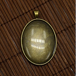 40x30mm Clear Oval Glass Cabochon Cover and Antique Bronze Alloy Blank Pendant Cabochon Settings for DIY Portrait Pendant Making&nbsp;DIY-X0159-AB-FF