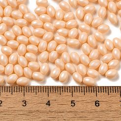 焼付塗装ガラスシードビーズ  オーバル  ライトサーモン  5x3.5mm  穴：0.8mm  約5000個/ポンド&nbsp;SEED-C004-04J