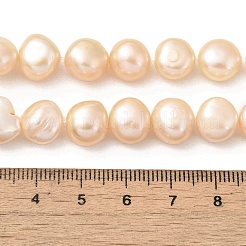 天然養殖淡水パールビーズ連売り  研磨両側  ライトサーモン  10~11mm  穴：0.5mm  約19個/連  6.89''（17.5センチメートル）&nbsp;PEAR-A006-11A