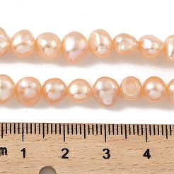 天然養殖淡水パールビーズ連売り  研磨両側  ライトサーモン  6~7mm  穴：0.5mm  約25個/連  6.69''（17センチメートル）&nbsp;PEAR-A006-07C