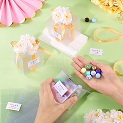 リボンと造花付きの透明なPVCキャンディギフト包装箱  結婚式用の折りたたみ収納ボックス  正方形  ゴールド  完成品：7x7x7cm&nbsp;CON-TAC0001-20D