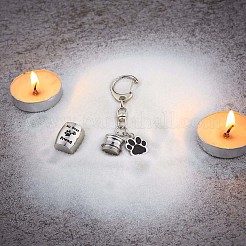 ペット壷キーチェーン 足跡壷ペンダントネックレス ペット火葬ジュエリー ステンレス鋼足跡キーホルダー ペットの記念品 猫と犬の壷 収納袋付き  ステンレス鋼色  7.5x1.6cm&nbsp;JX365A