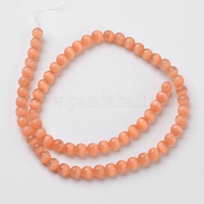 キャッツアイビーズ  ラウンド  ライトサーモン  10mm  穴：1mm  約39個/連  15インチ&nbsp;CER10mm55-1