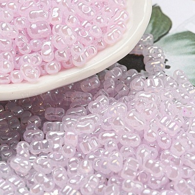 セイロンガラスシードビーズ  ピーナッツ  ピンク  4~4.5x2~2.5x2~2.5mm  穴：0.8~0.9mm  約10000個/ポンド&nbsp;SEED-K009-02B-28-1