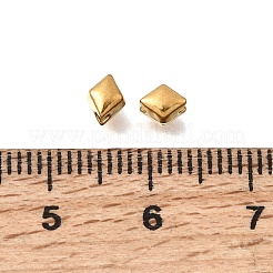 304ステンレススチールビーズ  イオンプレーティング（ip）  菱形  18KGP本金メッキ  5x4x4mm  穴：1.2mm&nbsp;STAS-L315-015G