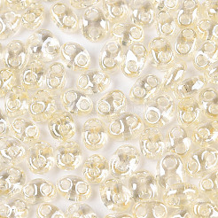 透明色光沢ガラスシードビーズ  オーバル  2穴  ベージュ  3~4.5x5~6x2.5~3mm  穴：1~1.2mm  約6080個/ポンド&nbsp;SEED-N008-09G