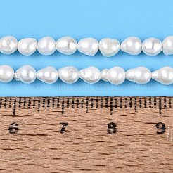 天然有核パールビーズ連売り  けし真珠  ライス  乳白色  3~8x2.5~4.5mm  穴：0.5mm  約59~103個/連  15.16~15.55インチ（38.5~39.5cm）&nbsp;PEAR-N012-02P-01