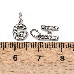 304ステンレススチールラインストーンペンダント  文字a~zのチャーム  丸カン付き  ステンレス鋼色  8~9.5x5.5~8.5x2mm  穴：3.5mm&nbsp;STAS-B108-03P-A