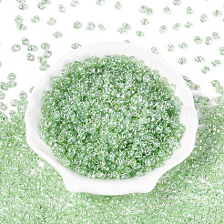 透明色光沢ガラスシードビーズ  オーバル  2穴  薄緑  3~4.5x5~6x2.5~3mm  穴：1~1.2mm  約6080個/ポンド&nbsp;SEED-N008-09D